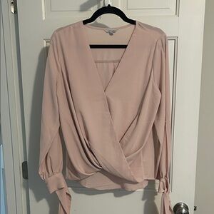 Elegant Blush Wrap Top with bow sleeves